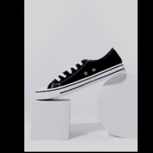 Low top black and white sneakers